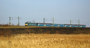 Electric locomotive V43 1030 hauls the regional train 5117 to Miskolc-Tiszai