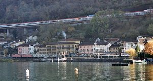 InterRegio is running to Lugano at the lakeport of Capolago, hauled by two class Re 4/4 II locos