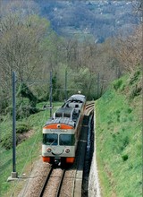 Near Muzzano, the railway descends to the valley of Lake Lugano again