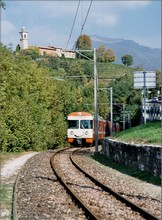 A train is coming under the church of Sorengo