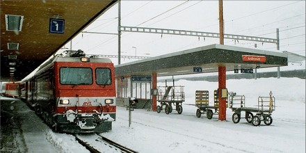 The train to Disentis is ready for departure on track 1.