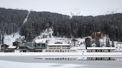 The station with both aerial lifts, viewed from the lake Obersee.