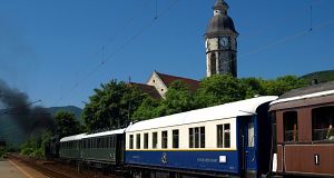 The steam train and the Exaltation of the Holy Cross Church