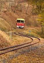 Approximately 1 km above Márianosztra, the first train in the morning, the brand new motor car 8444 001 is descending from Nagyirtás.