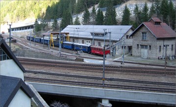 Passenger cars of Dampfbahn Furka Bergstrecke (DFB) on winter vacation at the freight transfer station